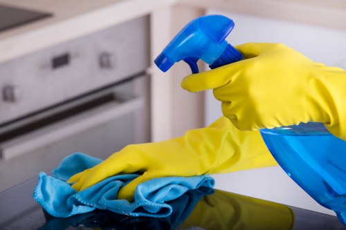 Commercial cleaning team preparing an office workspace in Hounslow